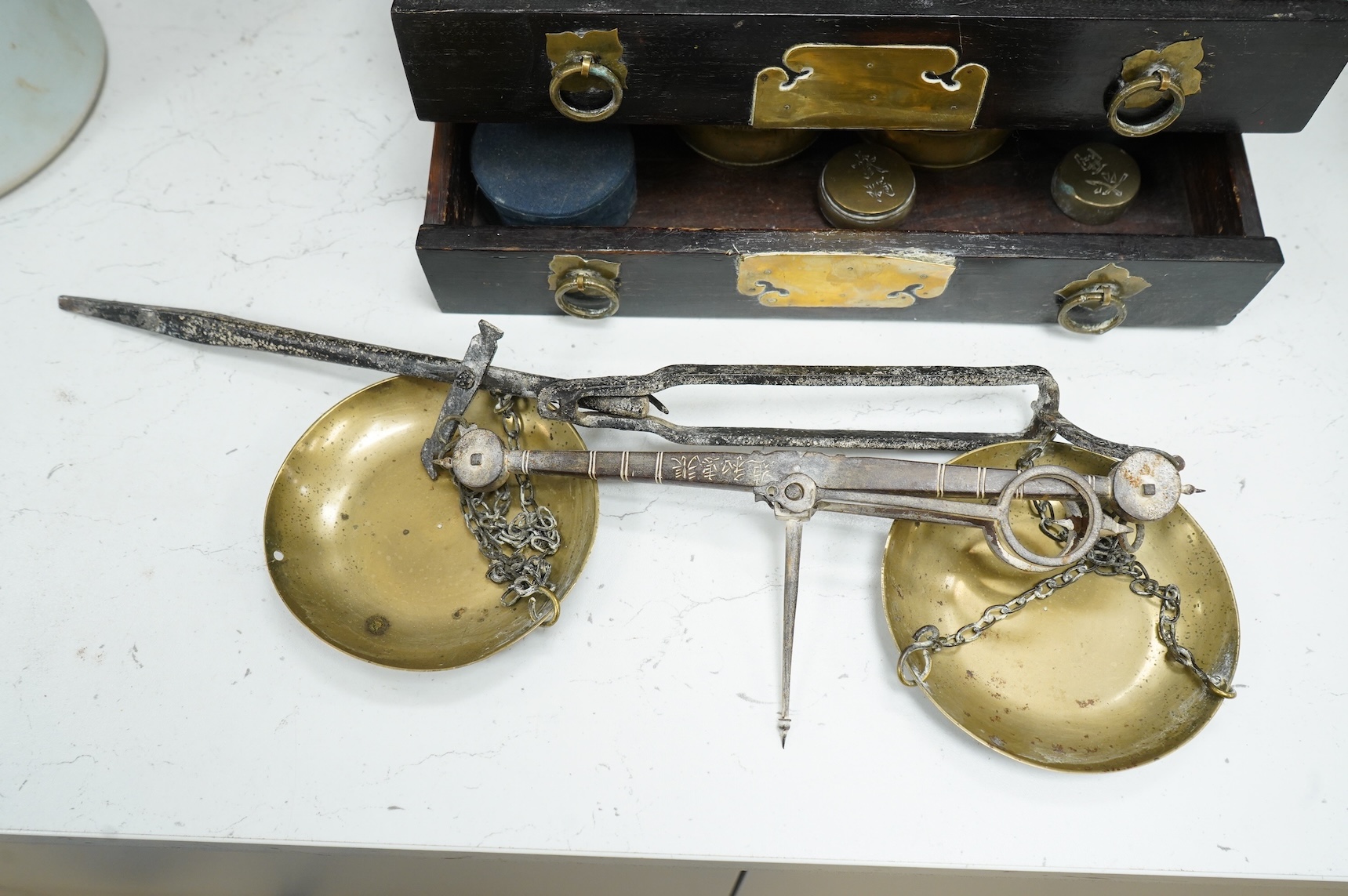 A pair of 19th century Japanese wood and brass mounted scales and weights, 31.5cm wide